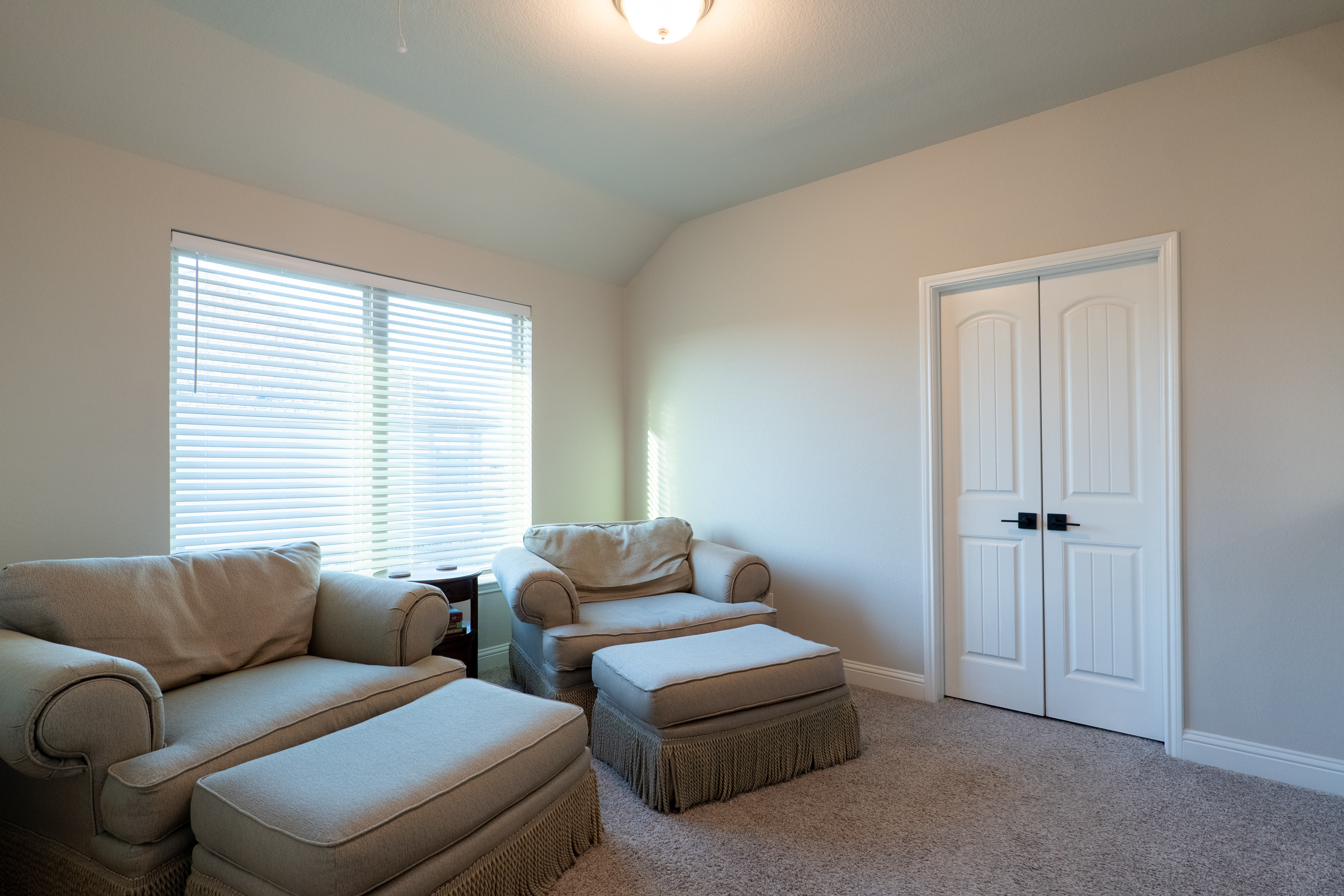Approx. 12′ × 11′ loft at the top of the stairs, leading to the media room.
