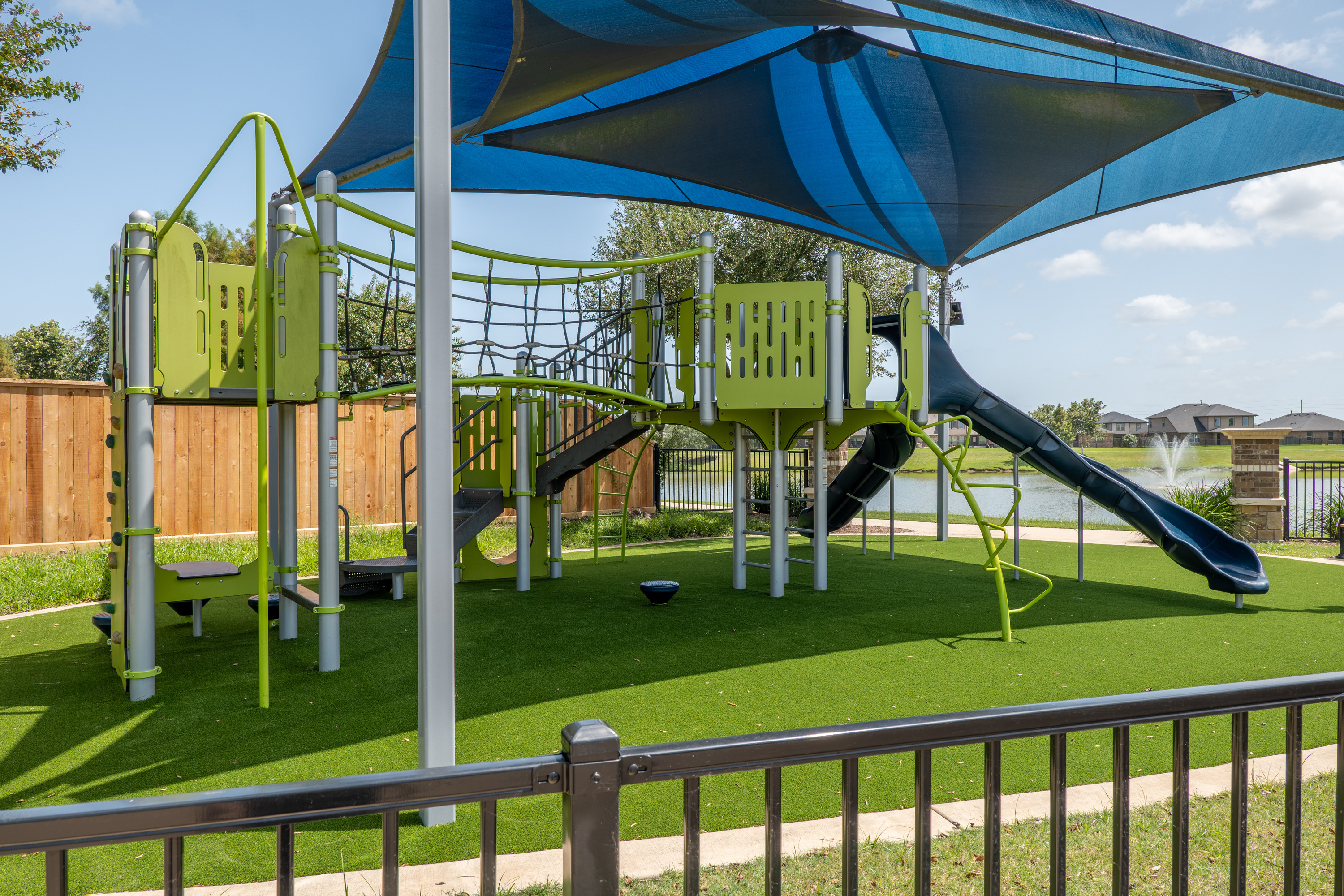 Attention to quality: New artificial turf installed at playground in 2026.